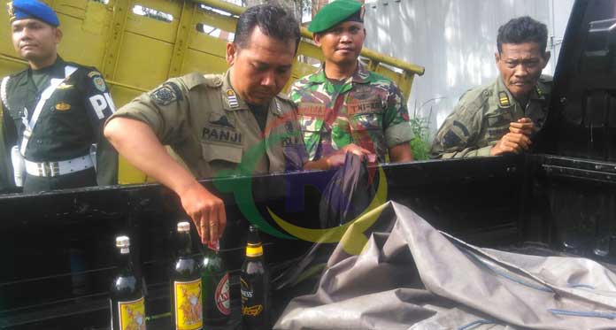 Kelabui Petugas, Sembunyikan Miras di Semak dan Bangkai Mobil