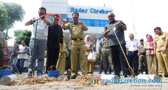 Cegah Banjir dengan Lubang Biopori dan Sumur Resapan