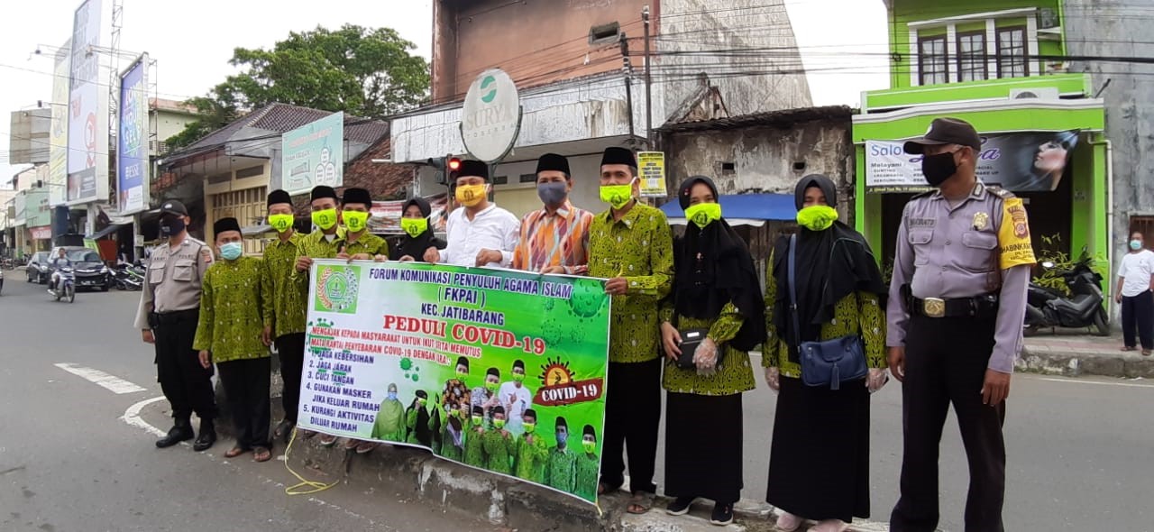 Forum Komunikasi Penyuluh Agama Islam Tebar Masker