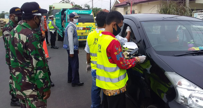 Maaf, Pengendara tanpa Masker dan Identitas Harus Putar Balik