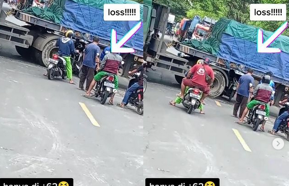 Nggak Sabaran, Pemotor Ini Masuk ke Kolong Truk yang Sedang Parkir