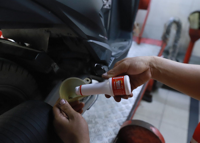 Ada yang Baru dari AHM, Oil System Cleaner untuk Menjaga Kebersihan Mesin Motor