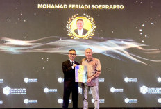 Dirut JNE Mohamad Feriadi Raih CEO of The Year di Indonesia Logistics Awards 2026